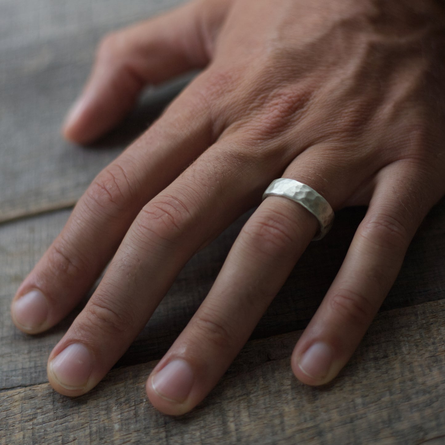 Hammered band on hand