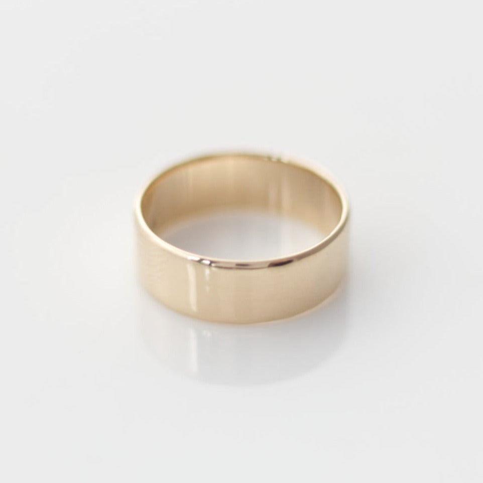 Wide yellow gold band