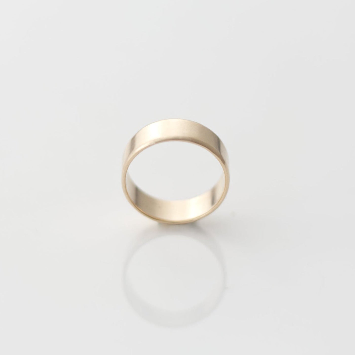 Wide yellow gold band