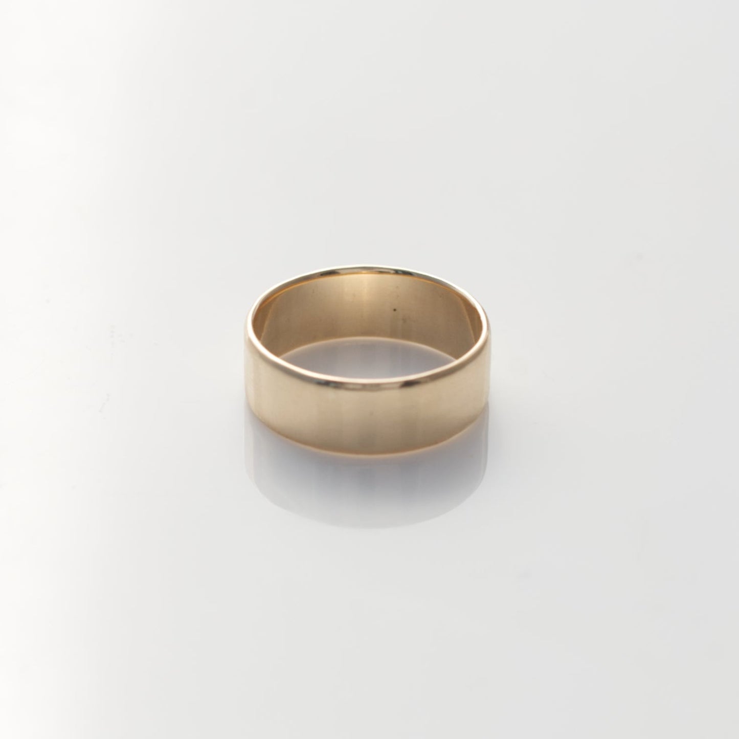 Wide yellow gold band