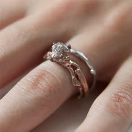 Thin branch ring on hand